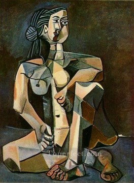 Mujer desnuda agachada 1956 Pablo Picasso Pinturas al óleo
